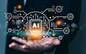 AI system and hand representing human-centered AI literacy